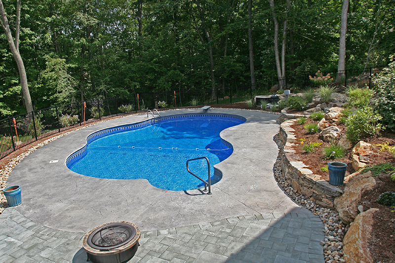 Swimming pool and stamped concrete project example 67